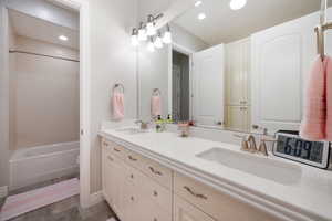 Bathroom with vanity and toilet