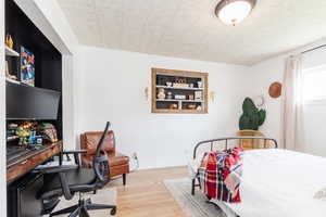 Bedroom with light wood-type flooring