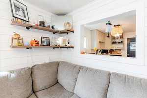 Living room with ornamental molding