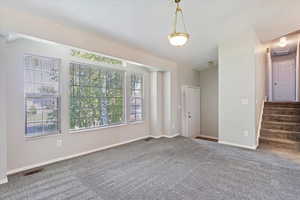 View of carpeted spare room