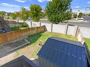 Fully Fenced Backyard with Storage Shed