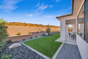 View of yard with a patio area