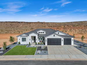 Ranch-style house with a garage, a front lawn, and covered porch