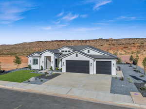 Single story home with a mountain view, a garage, and central air condition unit