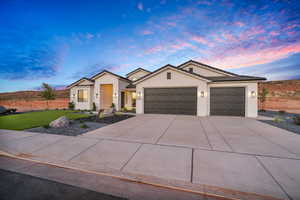 View of front of property featuring a garage