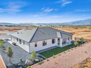 Birds eye view of property with a mountain view