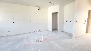 Kitchen area with corner pantry and island