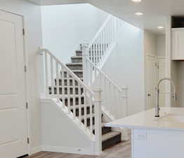 Sample pic of white painted wood railing selected for home. Options/sample pictures are for illustrative purposes only, and actual options/colors may vary from sample shown.