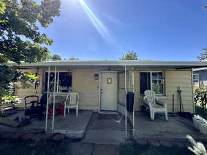 View of front of property featuring a patio area