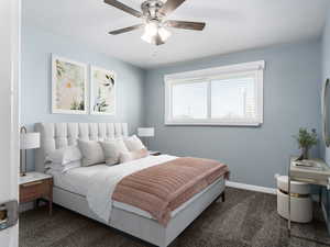 Carpeted bedroom with ceiling fan