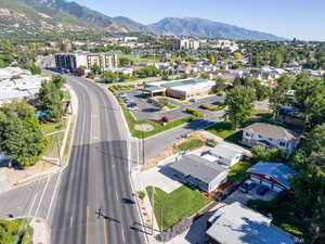 Birds eye view of property with a mountain view