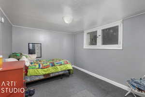 View of carpeted bedroom