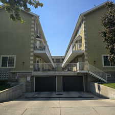 View of building exterior with a garage