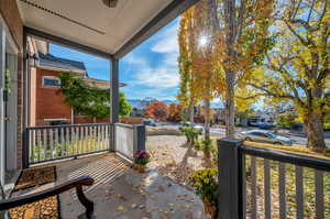 View of patio with a porch