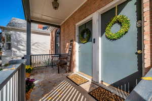 Property entrance with a porch