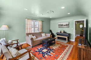 Living room featuring wood-type flooring