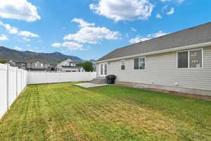 View of yard with a mountain view