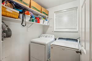 Clothes washing area with separate washer and dryer