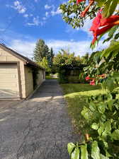 Back of house and driveway/Garage/Workshop