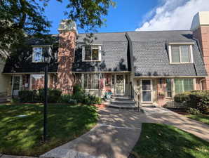 View of front of property with a front yard