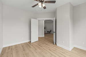 Bedroom/Office room with light wood-type flooring and ceiling fan