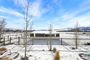 Exterior space featuring a mountain view