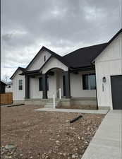 View of front of property featuring covered porch