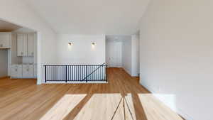 Spare room with light wood-type flooring