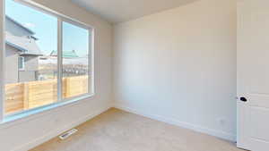 View of carpeted empty room