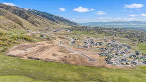 Birds eye view of property with a mountain view