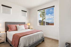 View of carpeted bedroom