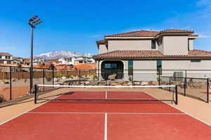 View of pickleball court with a mountain view