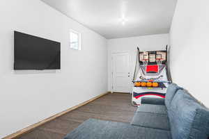 Playroom in garage featuring carpet flooring