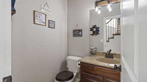 Bathroom with vanity and toilet