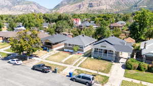 Birds eye view of property featuring a mountain view