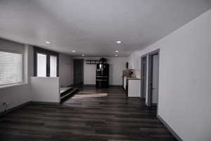 ADU space featuring a kitchen, bathroom/laundry combo. Bask in natural light in this unit with two walk-out entrances.