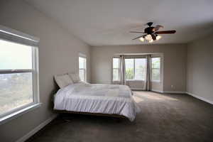 Extra large Main Bedroom featuring ceiling fan and bay windows