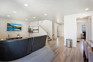 Separate hallway from kitchen to pantry and living room/formal dining area.