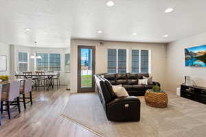 Family room, kitchen, and separate dining nook. Back door to covered deck and huge backyard.