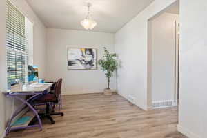 Living room or formal dining room with separate hallway to kitchen. Hallway could become a butler pantry