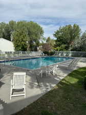 View of swimming pool with patio area in Wayland Station