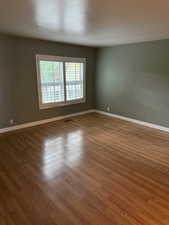 Master bedroom featuring hardwood / wood-style floors