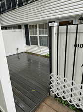 View of front gate and trex deck