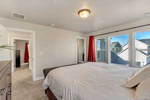 Master bedroom with beautiful light carpet