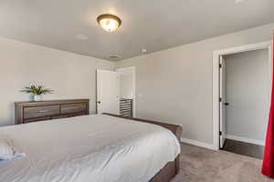 Master bedroom with beautiful light carpet