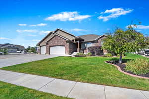 View of front of property with a front yard