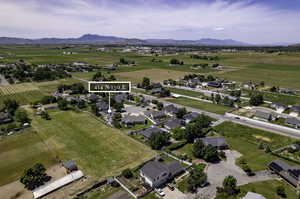 Drone / aerial view with a mountain view and a rural view