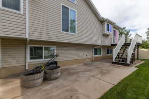 Back of property featuring a patio area