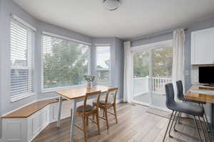 Dining space featuring light wood-type flooring