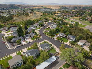 Birds eye view of property with a mountain view